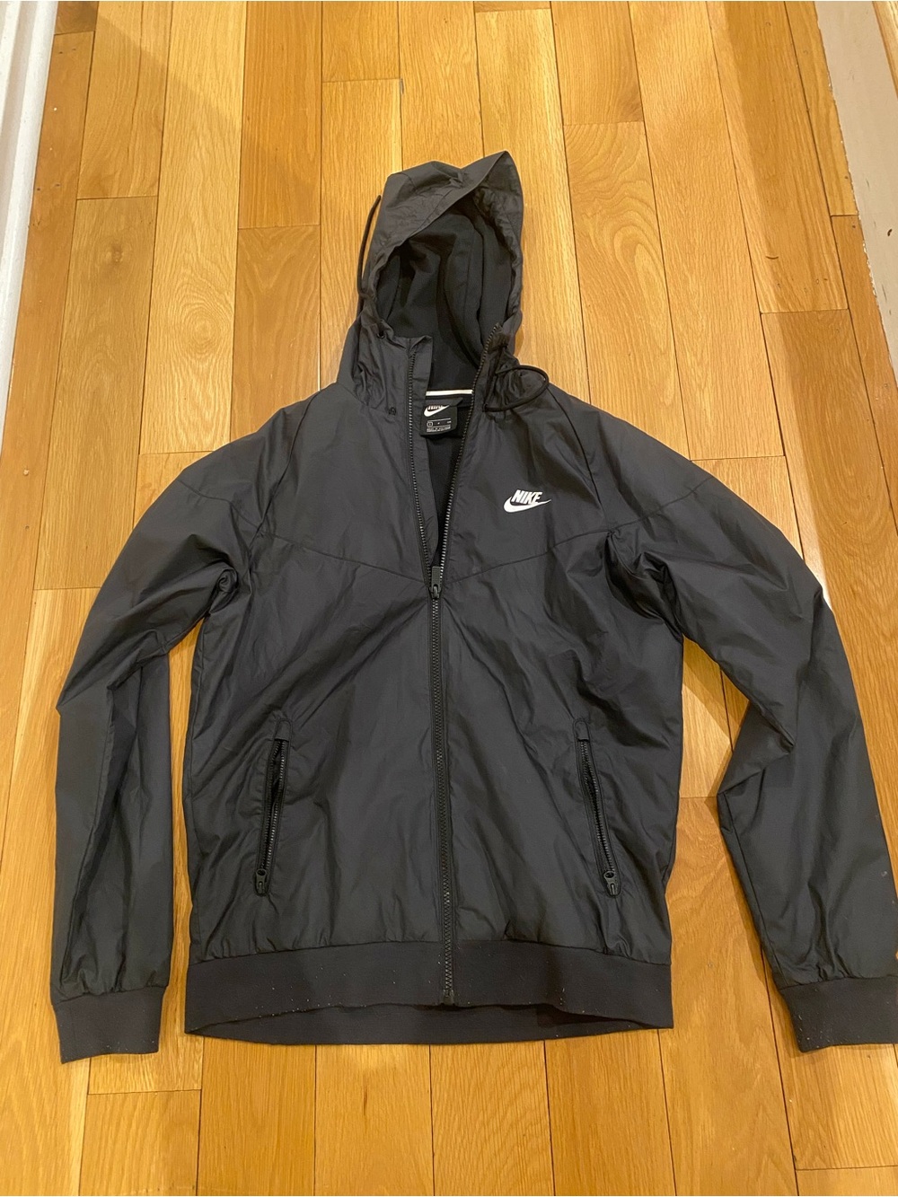 Nike Black Hooded Windbreaker with White Swoosh